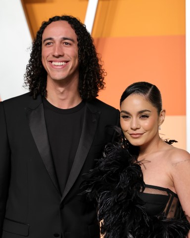 BEVERLY HILLS, CALIFORNIA - MARCH 02: (L-R) Cole Tucker and Vanessa Hudgens attend the 2025 Vanity Fair Oscar Party Hosted By Radhika Jones at Wallis Annenberg Center for the Performing Arts on March 02, 2025 in Beverly Hills, California.  (Photo by Dia Dipasupil/FilmMagic)
