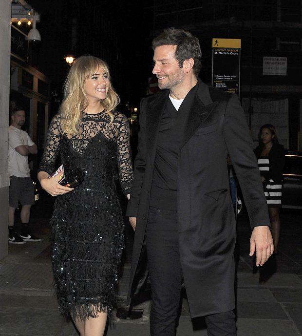 LONDON, ENGLAND - SEPTEMBER 15:  Suki Waterhouse and Bradley Cooper head to J Sheeky restaurant for dinner on September 15, 2014 in London, England.  (Photo by HKGC/GC Images)