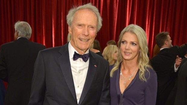 HOLLYWOOD, CA - FEBRUARY 22: Director Clint Eastwood (L) and Christina Sandera attend the 87th Annual Academy Awards at Hollywood & Highland Center on February 22, 2015 in Hollywood, California.  (Photo by George Pimentel/Getty Images)