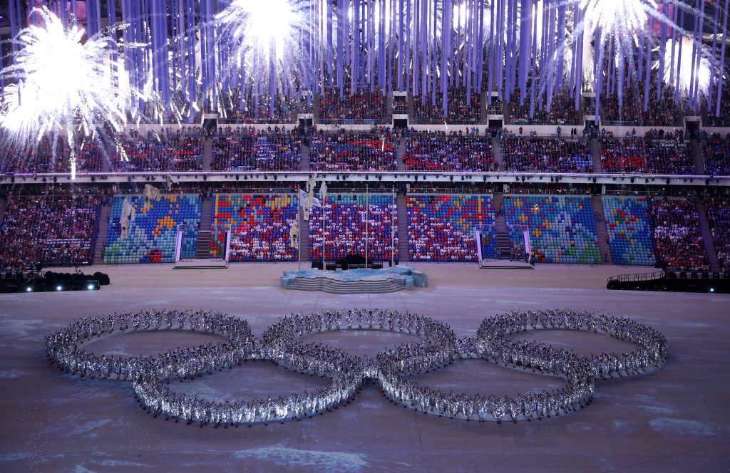 SOCHI, RUSSIA - FEBRUARY 23: Dancers form the Olympic rings during the 2014 Sochi Winter Olympics Closing Ceremony at Fisht Olympic Stadium on February 23, 2014 in Sochi, Russia. (Photo by Matthew Stockman/Getty Images)