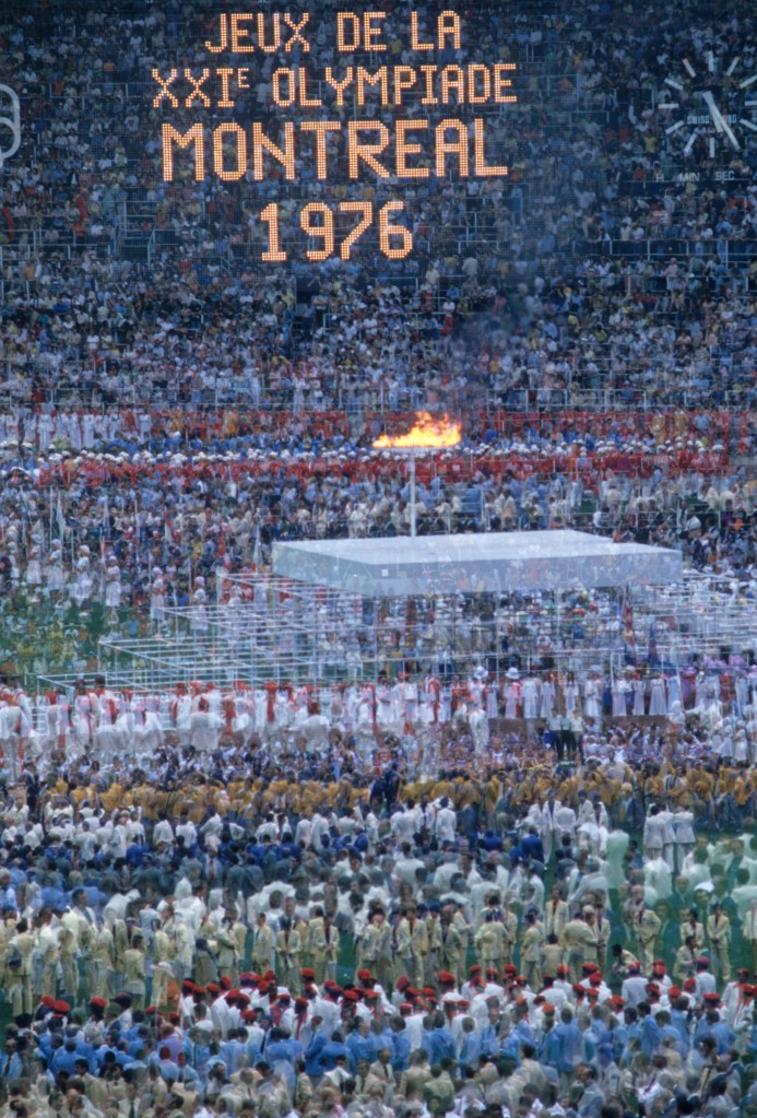  Double exposure and overall view of Stephane Olympic cauldron with flame during Parade of Nations at Olympic Stadium. Montreal, Canada 7/17/1976&#xA;CREDIT: Heinz Kluetmeier (Photo by Heinz Kluetmeier /Sports Illustrated via Getty Images)&#xA;(Set Number: X20682 TK2 R1 )