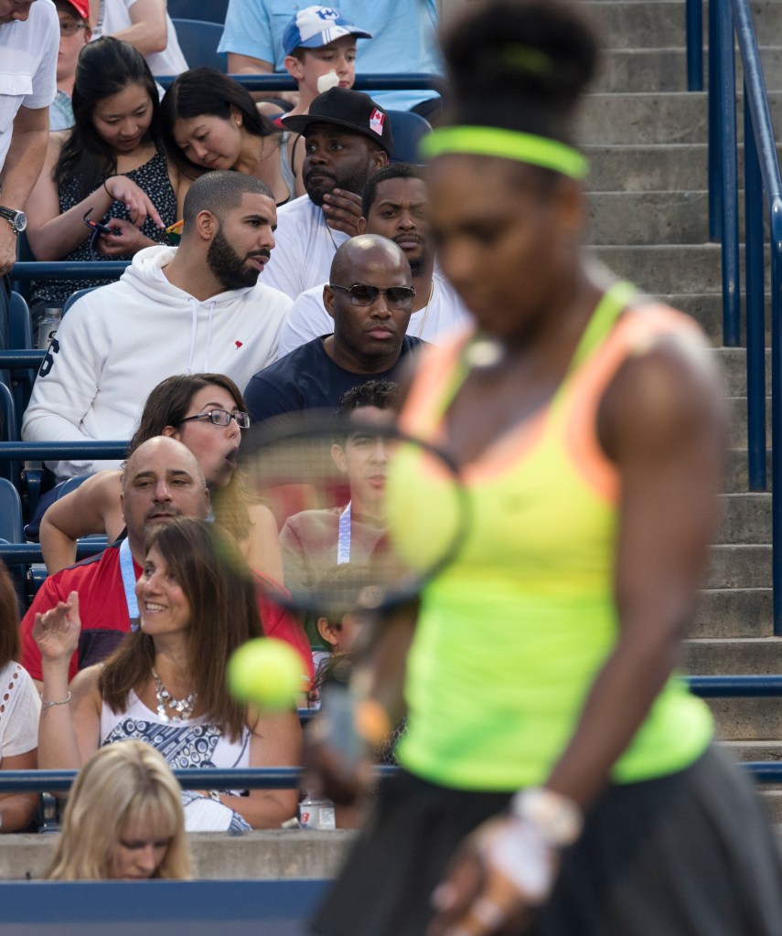 TORONTO, ONTARIO - AUGUST 15, 2015 - Drake (hoodie and beard) sits courtside for Serena Williams (USA) vs Belinda Bencic (SUI) in semi final tennis action of Rogers Cup play at the Aviva Centre on AUGUST 15, 2015. Williams loses 3-6, 7-5, 6-4. Rick Madonik/Toronto Star (Rick Madonik/Toronto Star via Getty Images)