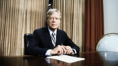 (Original Caption) 4/25/1980- Washington, DC: A grim-faced President Jimmy Carter, seated at desk in Oval Office of White House tells of the aborted rescue effort intended to get the 53 American hostages out of Iran. Carter said the mission was scrubbed after an "equipment failure" and that no military hostilities occurred.