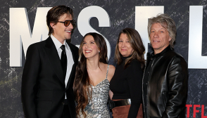 Millie Bobby Brown alongside Jake Bongiovi, Jon Bon Jovi, and Dorothea Hurley at event.