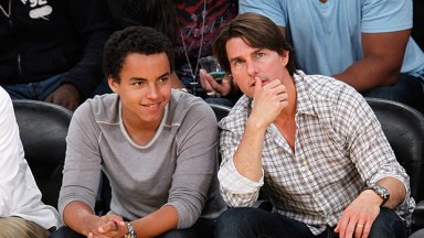 Tom Cruise and Connor Cruise at basketball game.