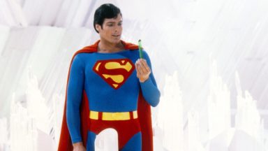 Superman, played by American actor Christopher Reeve (1952 - 2004), holds a green crystal at the Fortress of Solitude, in a promotional still from 'Superman', directed by Richard Donner, 1978. (Photo by Silver Screen Collection/Getty Images)