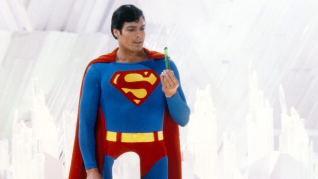 Superman, played by American actor Christopher Reeve (1952 - 2004), holds a green crystal at the Fortress of Solitude, in a promotional still from 'Superman', directed by Richard Donner, 1978. (Photo by Silver Screen Collection/Getty Images)