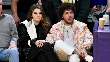 Selena Gomez and Benny Blanco attend a basketball game