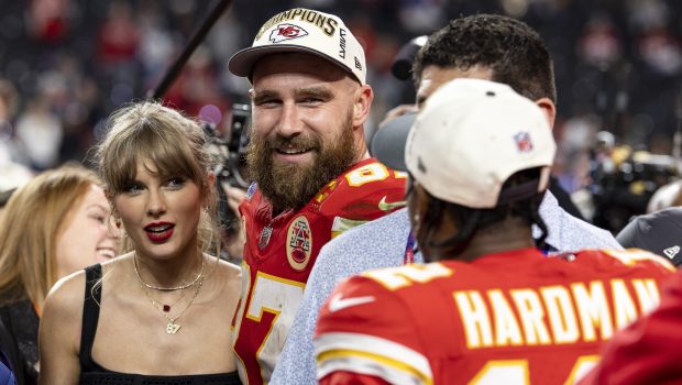 LAS VEGAS, NEVADA - FEBRUARY 11: Travis Kelce #87 of the Kansas City Chiefs and Taylor Swift react as they see Mecole Hardman Jr. #12 of the Kansas City Chiefs following the NFL Super Bowl 58 football game between the San Francisco 49ers and the Kansas City Chiefs at Allegiant Stadium on February 11, 2024 in Las Vegas, Nevada. (Photo by Michael Owens/Getty Images)