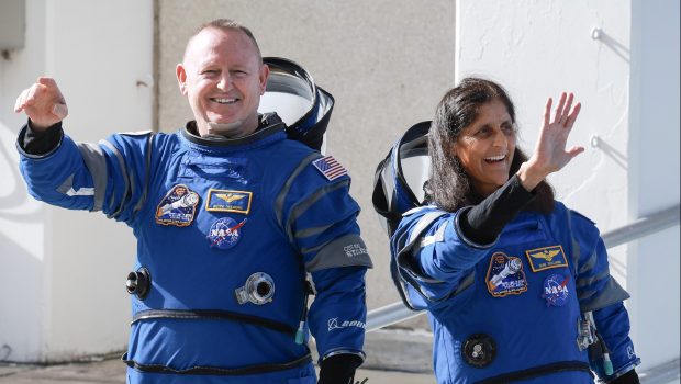 CAPE CANAVERAL, FLORIDA - JUNE 01:  NASA’s Boeing Crew Flight Test Commander Butch Wilmore (L) and Pilot Suni Williams walk out of the Operations and Checkout Building on June 01, 2024 in Cape Canaveral, Florida. The astronauts are heading to Boeing’s Starliner spacecraft, which sits atop a United Launch Alliance Atlas V rocket at Space Launch Complex 41 for NASA’s Boeing crew flight test to the International Space Station.  (Photo by Joe Raedle/Getty Images)