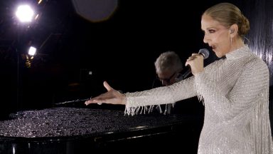 PARIS, FRANCE - JULY 26: (EDITOR'S NOTE: This Handout screengrab was provided by a third-party organization and may not adhere to Getty Images' editorial policy.) This handout released by the Olympic Broadcasting Services, shows a view of singer Celine Dion performing on the Eiffel Tower during the opening ceremony of the Paris 2024 Olympic Games Paris 2024 on July 26, 2024 in Paris, France. (Screengrab by IOC via Getty Images)