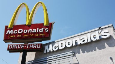 BURBANK, CALIFORNIA - JULY 22: The McDonald's logo is displayed at a McDonald's restaurant on July 22, 2024 in Burbank, California. McDonald’s is extending its $5 meal deal in most U.S. restaurants past its initial four-week offering with the fast-food icon saying the offer has driven customers back to its restaurants. (Photo by Mario Tama/Getty Images)