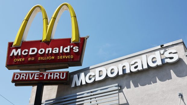 BURBANK, CALIFORNIA - JULY 22: The McDonald's logo is displayed at a McDonald's restaurant on July 22, 2024 in Burbank, California. McDonald’s is extending its $5 meal deal in most U.S. restaurants past its initial four-week offering with the fast-food icon saying the offer has driven customers back to its restaurants. (Photo by Mario Tama/Getty Images)