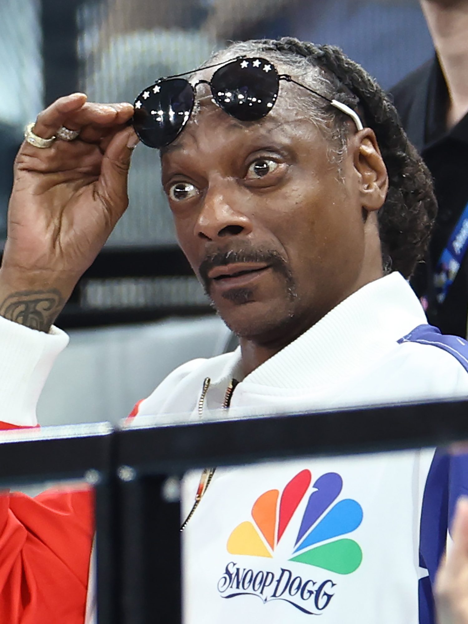 PARIS, FRANCE - JULY 28: Snoop Dogg (R) attends the Artistic Gymnastics Women's Qualification on day two of the Olympic Games Paris 2024 at Bercy Arena on July 28, 2024 in Paris, France. (Photo by Arturo Holmes/Getty Images)