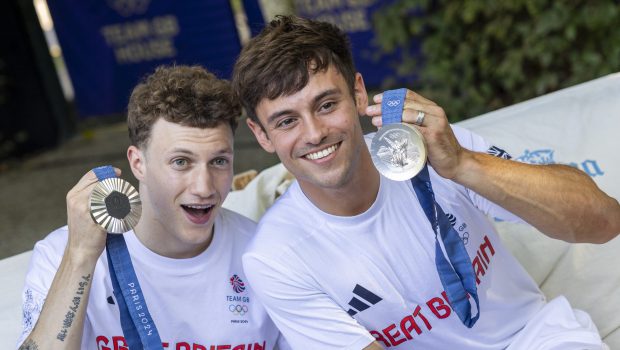 PARIS, FRANCE - JULY 29: Tom Daley (R) and Noah Williams of Team GB show off their silver medals after finishing second in 10m synchronised Platform at Olympic Games Paris 2024 at Team GB House on July 29, 2024 in Paris, France. (Photo by Matt Greaves/Team GB via Getty Images)