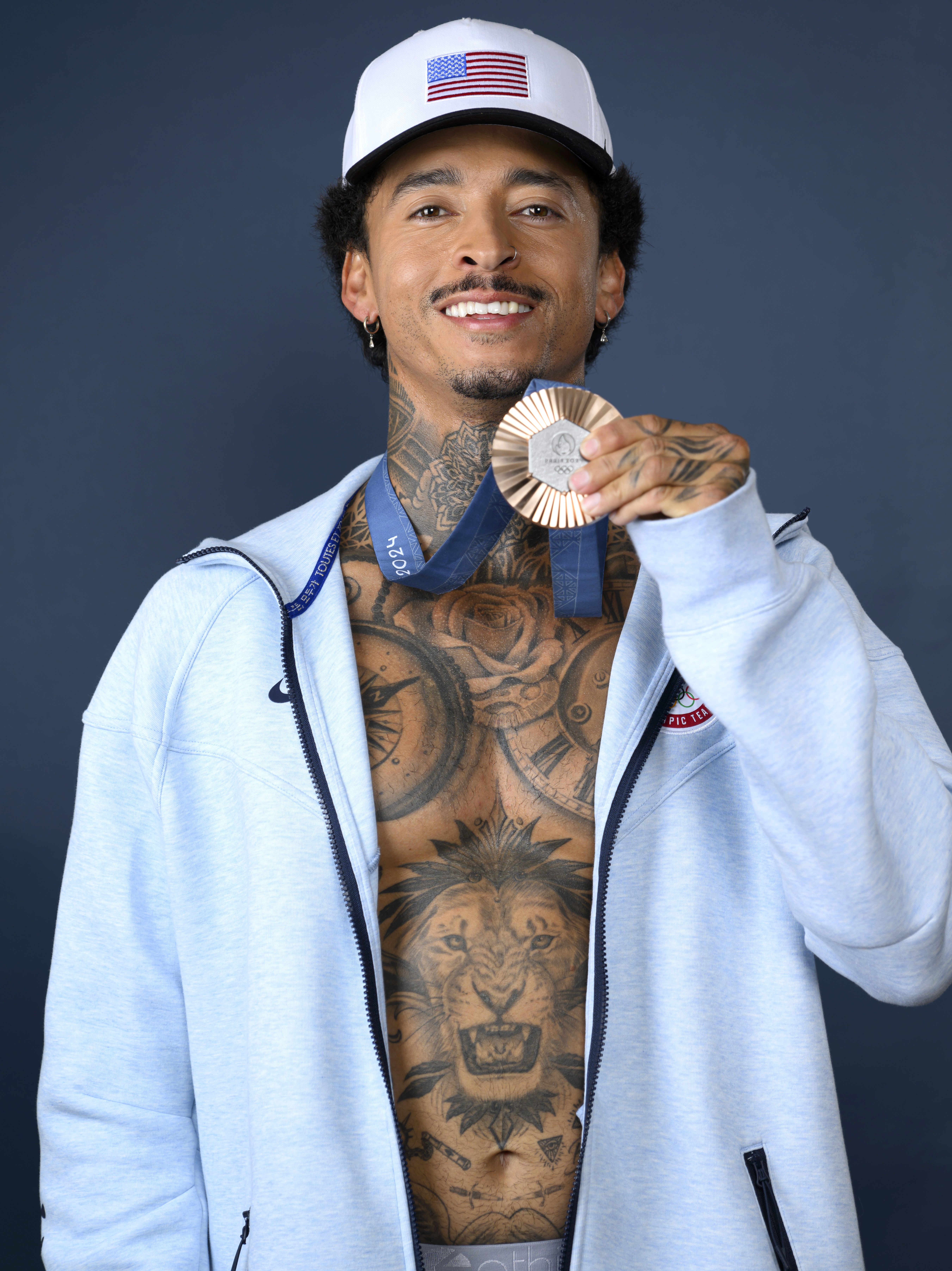 PARIS, FRANCE - JULY 30: (BROADCAST-OUT) Olympian Nyjah Huston of Team United States poses on the Today Show Set on July 30, 2024 in Paris, France. (Photo by Kristy Sparow/Getty Images)