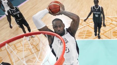 LILLE, FRANCE - JULY 31: (EDITORS NOTE: Image was captured using a remote camera positioned above the field of play) Lebron James #6 of Team United States goes up for a dunk during a Men's Group Phase - Group C game between the United States and South Sudan on day five of the Olympic Games Paris 2024 at Stade Pierre Mauroy on July 31, 2024 in Lille, France. (Photo by Pool/2024 Getty Images)