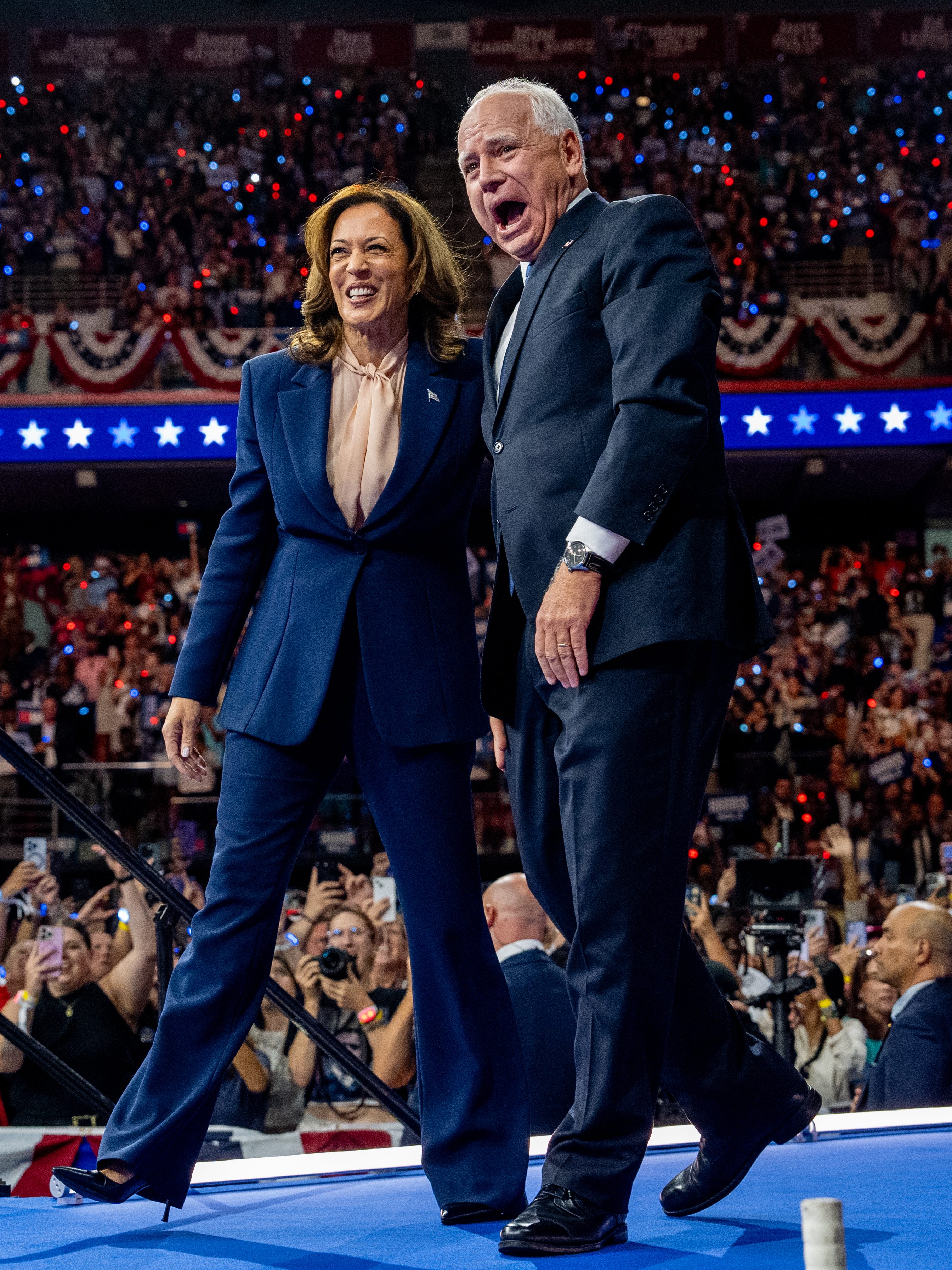 PHILADELPHIA, PENNSYLVANIA - AUGUST 6: Democratic presidential candidate, U.S. Vice President Kamala Harris and Democratic vice presidential nominee Minnesota Gov. Tim Walz walk out on stage together during a campaign event on August 6, 2024 in Philadelphia, Pennsylvania. Harris ended weeks of speculation about who her running mate would be, selecting the 60 year old midwestern governor over other candidates. (Photo by Andrew Harnik/Getty Images)