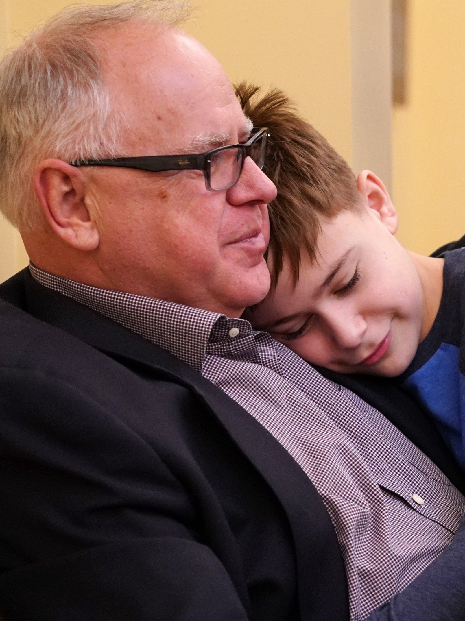 ST. PAUL, MN. - JANUARY 2019: Minnesota DFL(Democratic-Farmer-Labor Party) Governor-elect Tim Walz gave a hug to his son Gus during a birthday party for his daughter Hope, Sunday, January 6, 2019 at the State Capitol in St. Paul, Minn. (Photo by Anthony Souffle/Star Tribune via Getty Images)