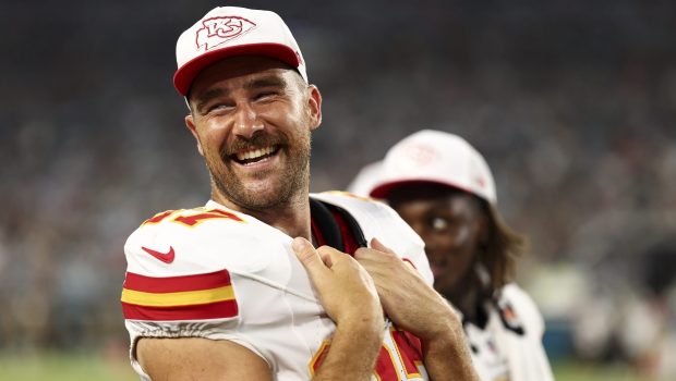 JACKSONVILLE, FL - AUGUST 10: Travis Kelce #87 of the Kansas City Chiefs smiles on the sidelines during the second quarter of an NFL preseason football game against the Jacksonville Jaguars at EverBank Stadium on August 10, 2024 in Jacksonville, Florida. (Photo by Kevin Sabitus/Getty Images)