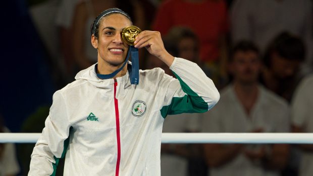 PARIS, FRANCE - AUGUST 09: Gold Medallist Imane Khelif of Team Algeria celebrates during the Boxing Women's 66kg medal ceremony after the Boxing Women's 66kg Final match on day fourteen of the Olympic Games Paris 2024 at Roland Garros on August 09, 2024 in Paris, France. (Photo by Andy Cheung/Getty Images)