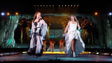 LONDON, ENGLAND - AUGUST 20: EDITORIAL USE ONLY. NO COVERS. Florence Welch of Florence + The Machine and Taylor Swift perform onstage during "Taylor Swift | The Eras Tour" at Wembley Stadium on August 20, 2024 in London, England. (Photo by TAS2024/Getty Images)