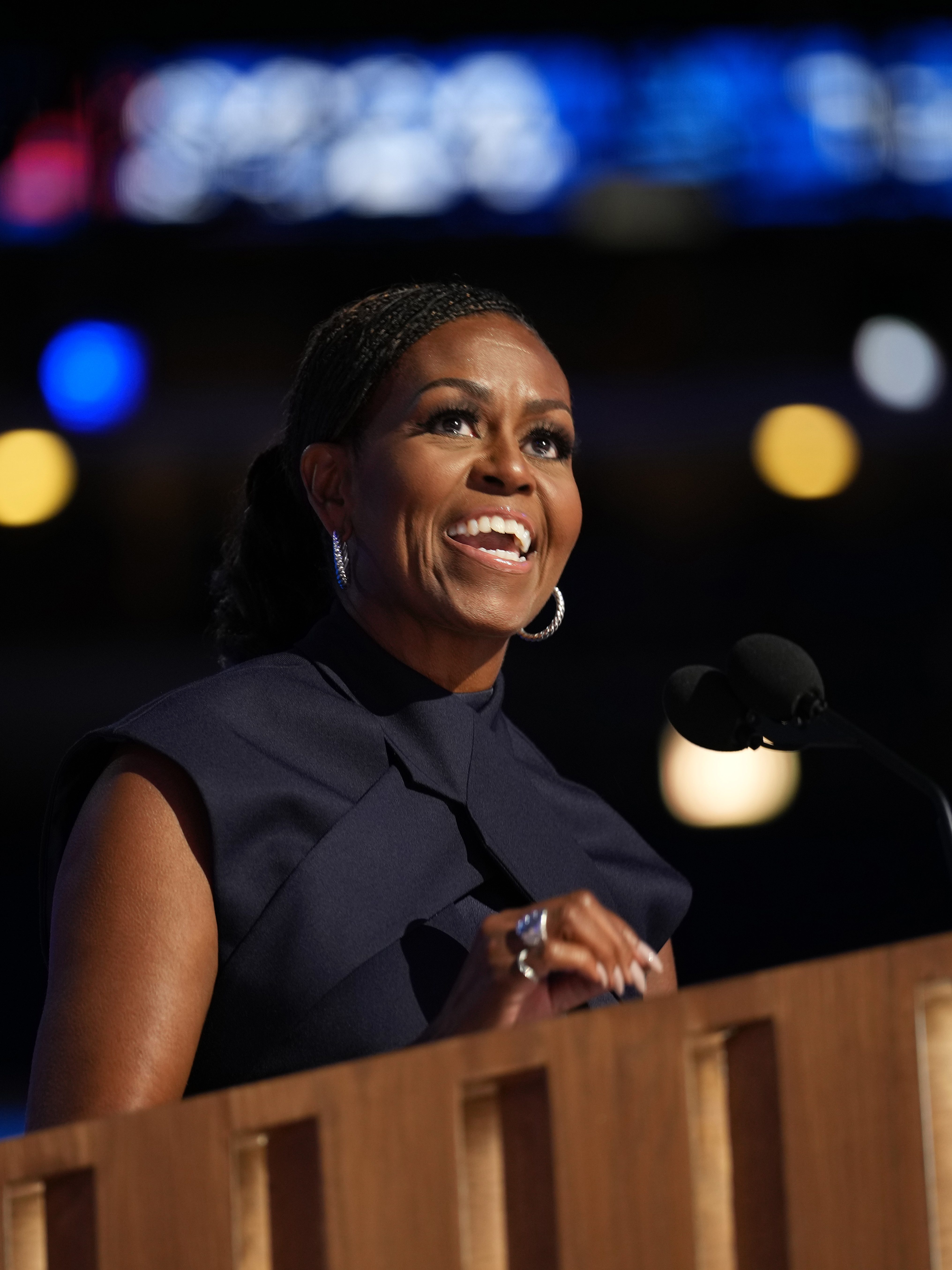 CHICAGO, ILLINOIS - AUGUST 20: Former first lady Michelle Obama speaks on stage during the second day of the Democratic National Convention at the United Center on August 20, 2024 in Chicago, Illinois. Delegates, politicians, and Democratic Party supporters are gathering in Chicago, as current Vice President Kamala Harris is named her party's presidential nominee. The DNC takes place from August 19-22. (Photo by Andrew Harnik/Getty Images)