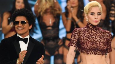 Bruno Mars and Lady Gaga walk the runway