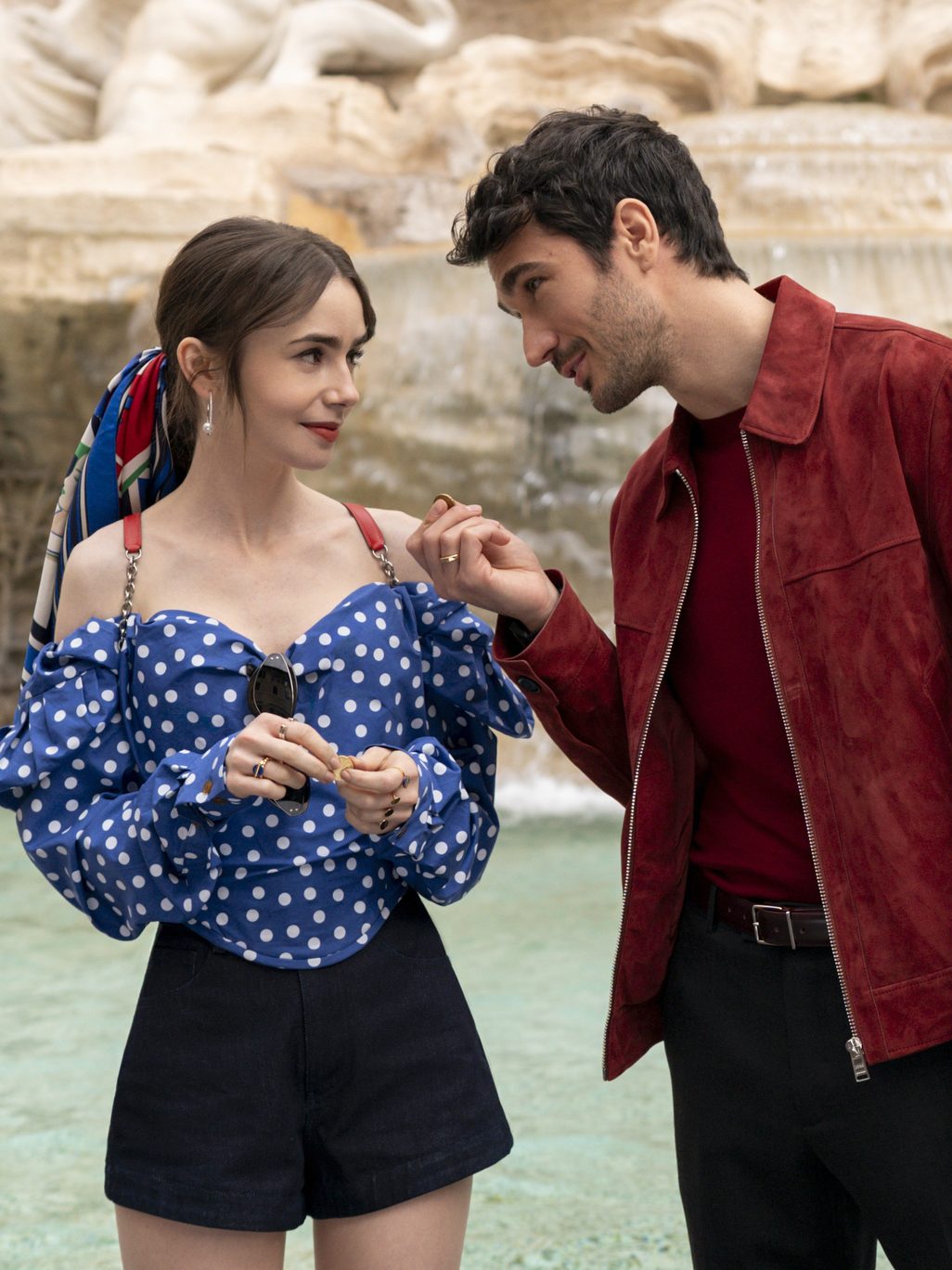 Emily in Paris. (L to R) Lily Collins as Emily, Eugenio Franceschini as Marcello in episode 409 of Emily in Paris. Cr. Giulia Parmigiani/Netflix © 2024