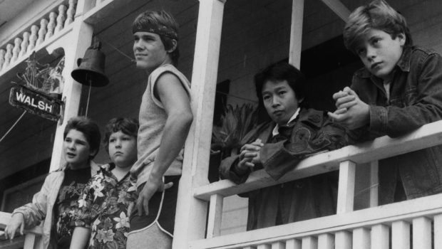 Corey Feldman, Jeff Cohen, Josh Brolin, Ke Huy Quand and Sean Astin standing on porch in a scene from 'Goonies'