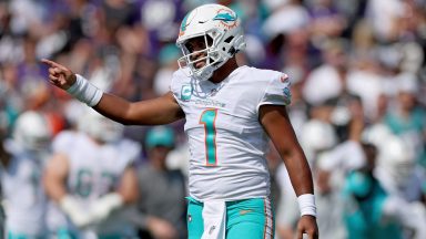  Tua Tagovailoa #1 of the Miami Dolphins celebrates a touchdown in the second quarter against the Baltimore Ravens at M&T Bank Stadium on September 18, 2022 in Baltimore, Maryland. (Photo by Patrick Smith/Getty Images)