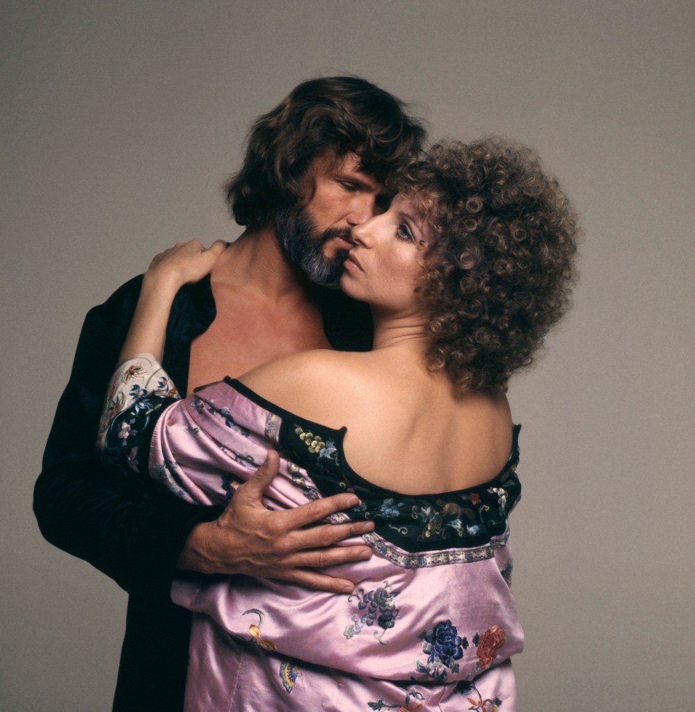 A Star is Born Barbra Streisand and Kris Kristofferson pose for a romantic publicity portrait for the 1976 movie. (Photo by Screen Archives/Getty Images)