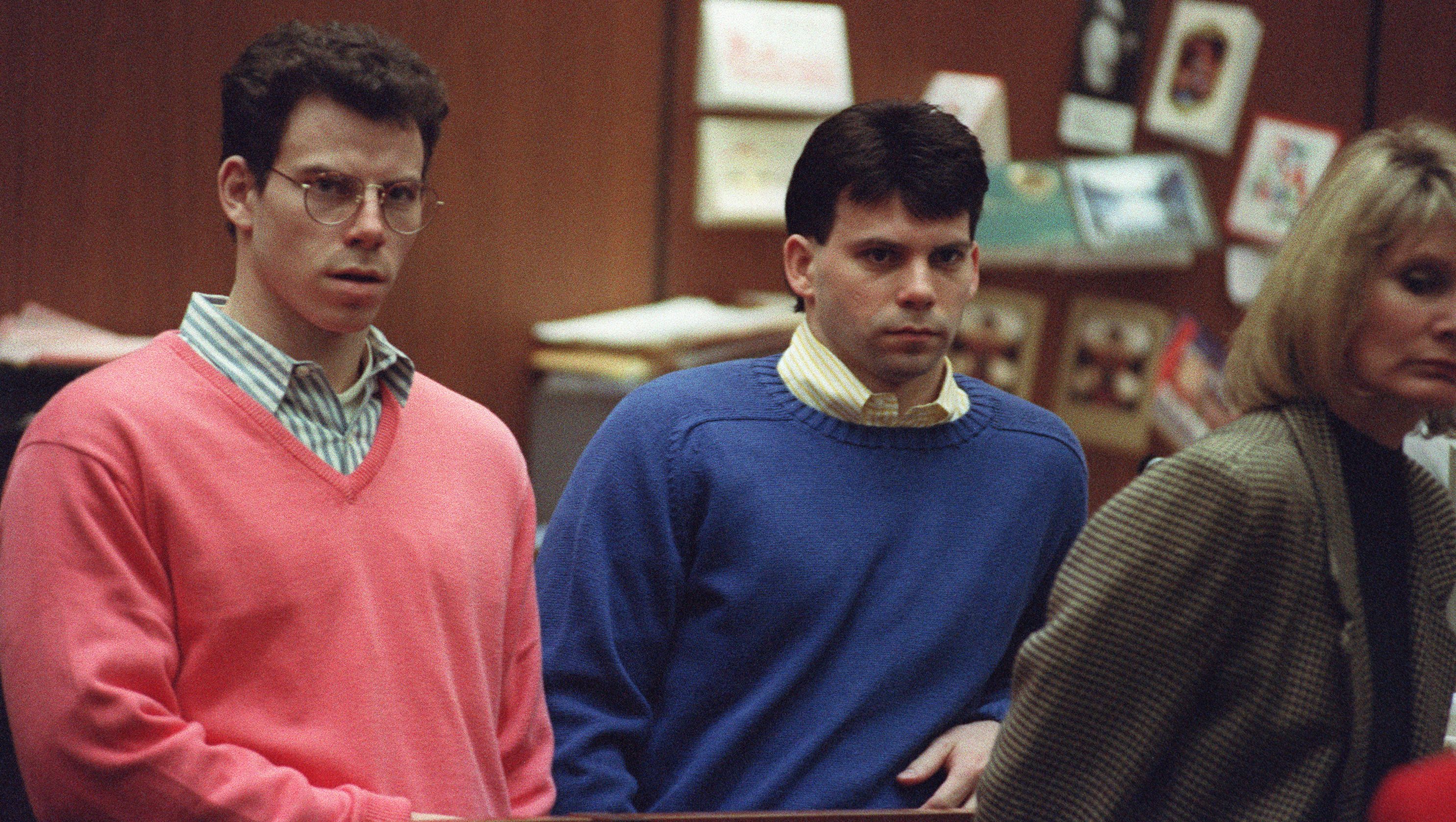 Erik Menendez (L) and his brother Lyle (R) listen during a pre-trial hearing, on December 29, 1992 in Los Angeles after the two pleaded innocent in the August 1989 shotgun deaths of their wealthy parents, Jose and Mary Louise Menendez of Beverly Hills, Calif. It took 40 months for the Superior Court arraignment after prosecutors and defense attorneys battled over the admissibility of taped confessions the brothers allegedly made to their psychotherapist. AFP PHOTO VINCE BUCCI (Photo by VINCE BUCCI / AFP) (Photo by VINCE BUCCI/AFP via Getty Images)