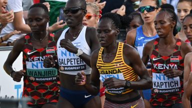 (From L to R) Kenya's Rosemary Wanjiru, Israel's Lonah Chemtai Salpeter, Uganda's Rebecca Cheptegei and Kenya's Selly Chepyego Kaptich compete in the women's marathon final during the World Athletics Championships in Budapest on August 26, 2023. (Photo by Ferenc ISZA / AFP) (Photo by FERENC ISZA/AFP via Getty Images)