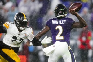  Tyler Huntley #2 of the Baltimore Ravens throws a pass while being pressured by Larry Ogunjobi #99 of the Pittsburgh Steelers in the first quarter of a game at M&T Bank Stadium on January 06, 2024 in Baltimore, Maryland. (Photo by Rob Carr/Getty Images)