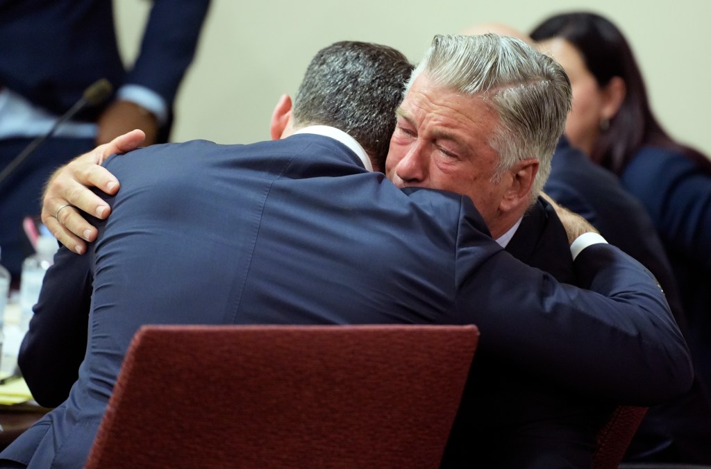 Alec Baldwin hugs his attorney Alex Spiro at the conclusion of his trial for involuntary manslaughter in First Judicial District Court on July 12 2024 in Santa Fe New Mexico The trial for involuntary manslaughter was dismissed by a judge Friday after she ruled that key evidence over a fatal shooting on the set of Rust had been withheld from the defense Photo by Ramsay de Give PoolGetty Images