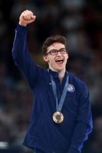  Bronze medalist Stephen Nedoroscik of Team United States celebrates on the podium during the medal ceremony for the Artistic Gymnastics Men's Pommel Horse Final on day eight of the Olympic Games Paris 2024 at Bercy Arena on August 03, 2024 in Paris, France. (Photo by Julian Finney/Getty Images)