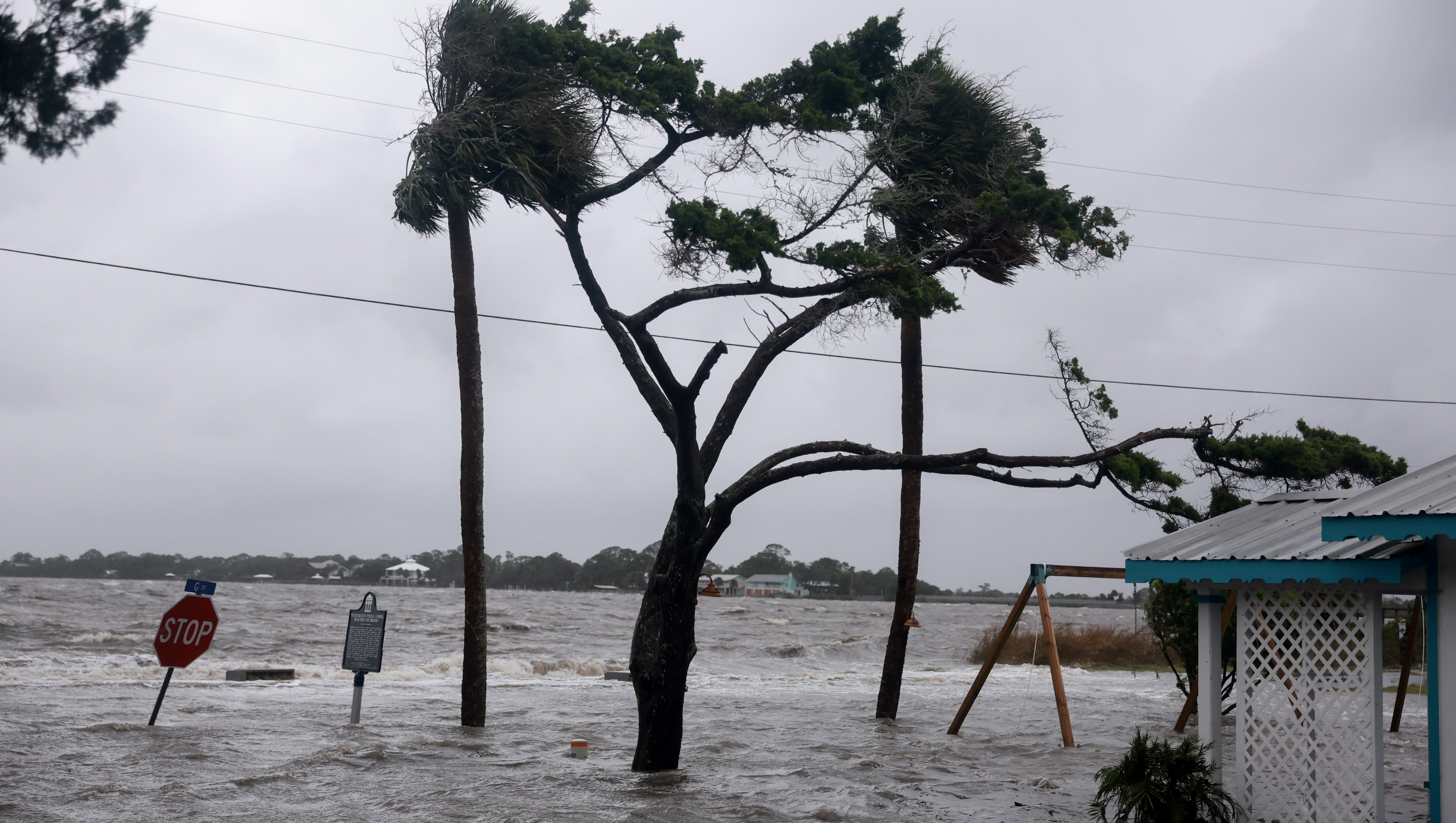 CEDAR KEY, FLORIDA - AUGUST 05: High winds, rain and storm surge from Hurricane Debby inundate a neighborhood on August 05, 2024, in Cedar Key, Florida. Hurricane Debby brings rain storms and high winds along Florida’s Big Bend area. (Photo by Joe Raedle/Getty Images)