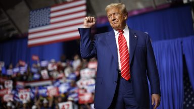  Republican presidential nominee, former U.S. President Donald Trump takes the stage during a campaign rally in the 1st Summit Arena at the Cambria County War Memorial on August 30, 2024 in Johnstown, Pennsylvania. Promising to cut energy bills in half, conducting the largest deportation operation in history and putting a 200% tariff on foreign made automobiles, Trump called his election opponents "Comrade Kamala," and "Tampon Tim" while rallying in the all-important battleground state of Pennsylvania. (Photo by Chip Somodevilla/Getty Images)