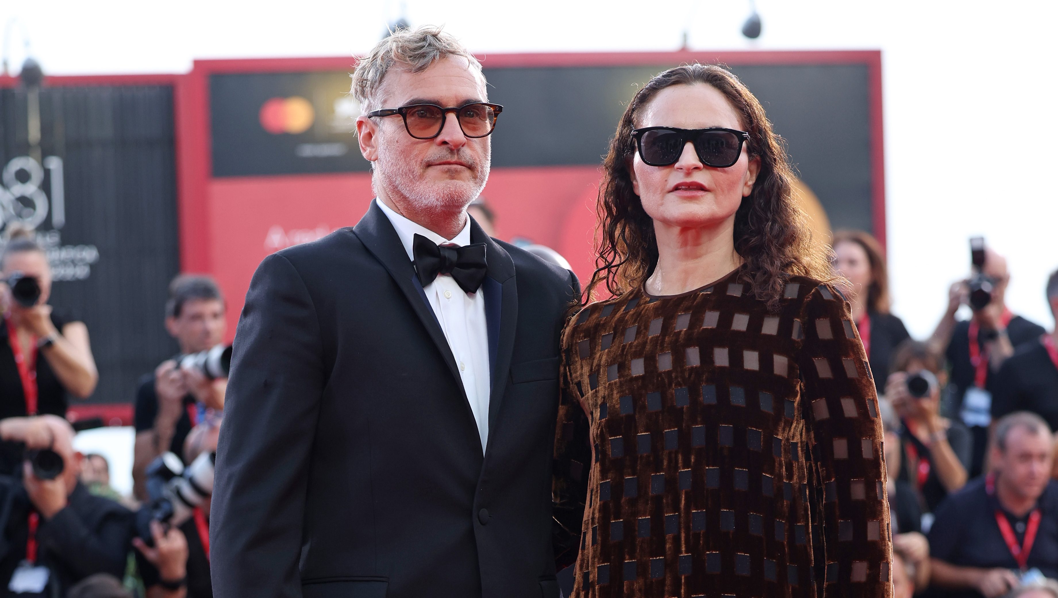 VENICE, ITALY - SEPTEMBER 04: Joaquin Phoenix and his sister Rain Phoenix attend the "Joker: Folie à Deux" red carpet during the 81st Venice International Film Festival at Sala Grande on September 04, 2024 in Venice, Italy. (Photo by Vittorio Zunino Celotto/Getty Images)