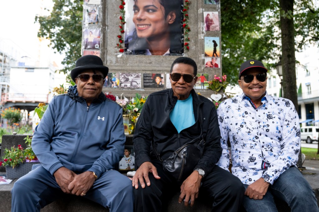 09 September 2024, Bavaria, Munich: The Music Band "The Jacksons" with Tito (lr), Jackie and Marlon Jackson sit before a press conference in front of the Michael Jackson memorial in front of the Hotel Bayerischer Hof. On September 10, 2024 "The Jacksons" play their only concert in Germany so far at the Circus Krone in Munich. Photo: Lennart Preiss/dpa (Photo by Lennart Preiss/picture alliance via Getty Images)