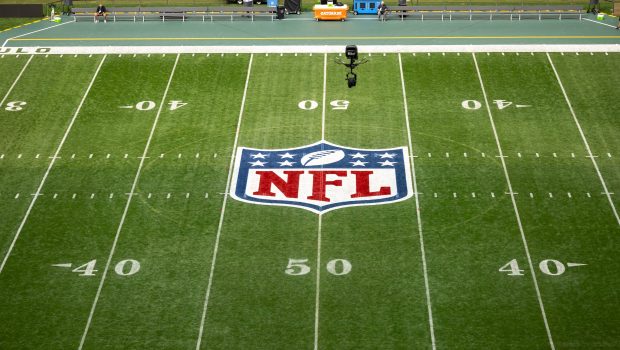 SÃO PAULO, BRAZIL - SEPTEMBER 6: The NFL shield is displayed on the field prior to an NFL game between the Green Bay Packers and the Philadelphia Eagles, at Arena Corinthians on September 6, 2024 in Sao Paulo, Brazil. (Photo by Brooke Sutton/Getty Images)