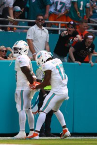  Tyreek Hill #10 of the Miami Dolphins and Jaylen Waddle #17 of the Miami Dolphins celebrate after Hill's receiving touchdown during the third quarter against the Jacksonville Jaguars at Hard Rock Stadium on September 08, 2024 in Miami Gardens, Florida. (Photo by Megan Briggs/Getty Images)