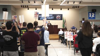 Aerospace Machinists District 751 President Jon Holden announces that union members have rejected a proposed Boeing contract and will go on strike, following voting results at their union hall in Seattle, Washington, on September 12, 2024. Boeing workers in the Seattle region overwhelmingly voted to strike on September 12, rejecting a contract the embattled aviation giant characterized as a boon for staff given the company's stressed financial condition. (Photo by Jason Redmond / AFP) (Photo by JASON REDMOND/AFP via Getty Images)