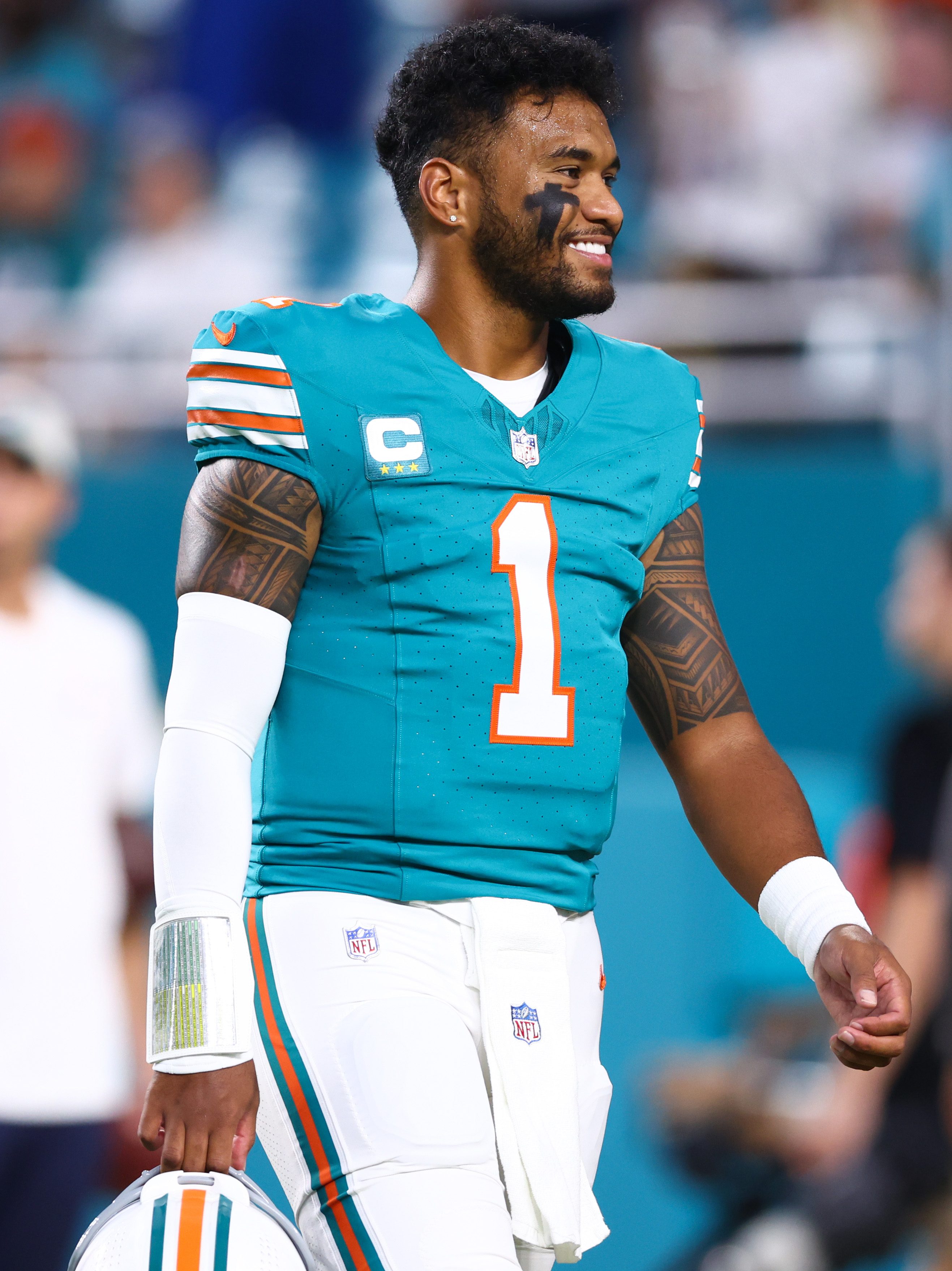 MIAMI GARDENS, FLORIDA - SEPTEMBER 12: Tua Tagovailoa #1 of the Miami Dolphins looks on prior to a game against the Buffalo Bills at Hard Rock Stadium on September 12, 2024 in Miami Gardens, Florida. (Photo by Megan Briggs/Getty Images)