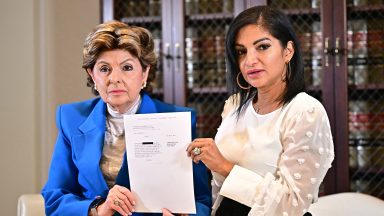 Attorney Gloria Allred and Thalia Graves, an alleged victim of Rap mogul Sean Diddy Combs, hold a copy of a criminal complaint during a press conference in Los Angeles on September 24, 2024. Graves is suing Combs for rape. Combs is imprisoned pending trial on racketeering and sex trafficking charges, after Judge Andrew Carter upheld a ruling on Septemebr 18, that the bail package proposed by his defense team was insufficient given his history of violence and substance abuse, and the possibility of witness tampering. (Photo by Frederic J. Brown / AFP) (Photo by FREDERIC J. BROWN/AFP via Getty Images)