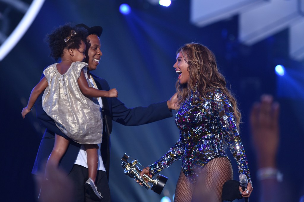 INGLEWOOD, CA - AUGUST 24: (L-R) Blue Ivy Carter, recording artists Jay Z and Beyonce speak onstage during the 2014 MTV Video Music Awards at The Forum on August 24, 2014 in Inglewood, California. (Photo by MTV/MTV1415/Getty Images for MTV)