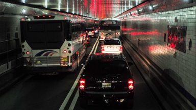  Bus passengers  on board a Megabus coach service are caught in traffic November 10, 2014 in the Lincoln Tunnel in Weehawken, New Jersey. (Photo by Robert Nickelsberg/Getty Images)