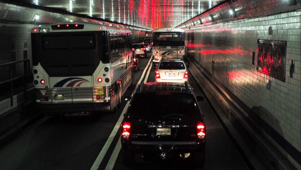 WEEHAWKEN, NEW JERSEY - NOVEMBER 10: Bus passengers  on board a Megabus coach service are caught in traffic November 10, 2014 in the Lincoln Tunnel in Weehawken, New Jersey. (Photo by Robert Nickelsberg/Getty Images)