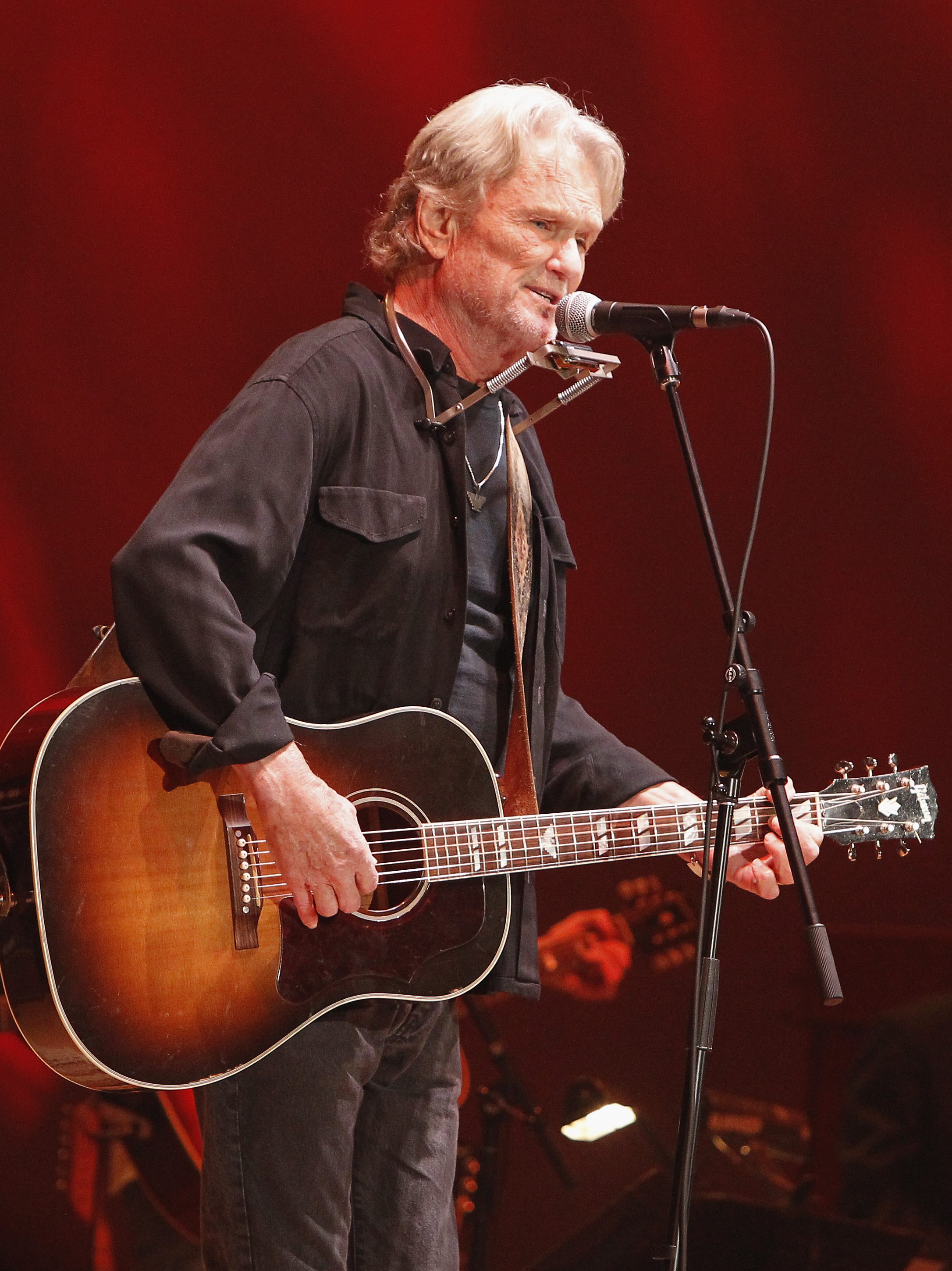 Kris Kristofferson performs on stage during The Life & Songs of Emmylou Harris: An All Star Concert Celebration at DAR Constitution Hall on January 10, 2015 in Washington, DC. (Photo by Paul Morigi/Getty Images for Blackbird Productions)